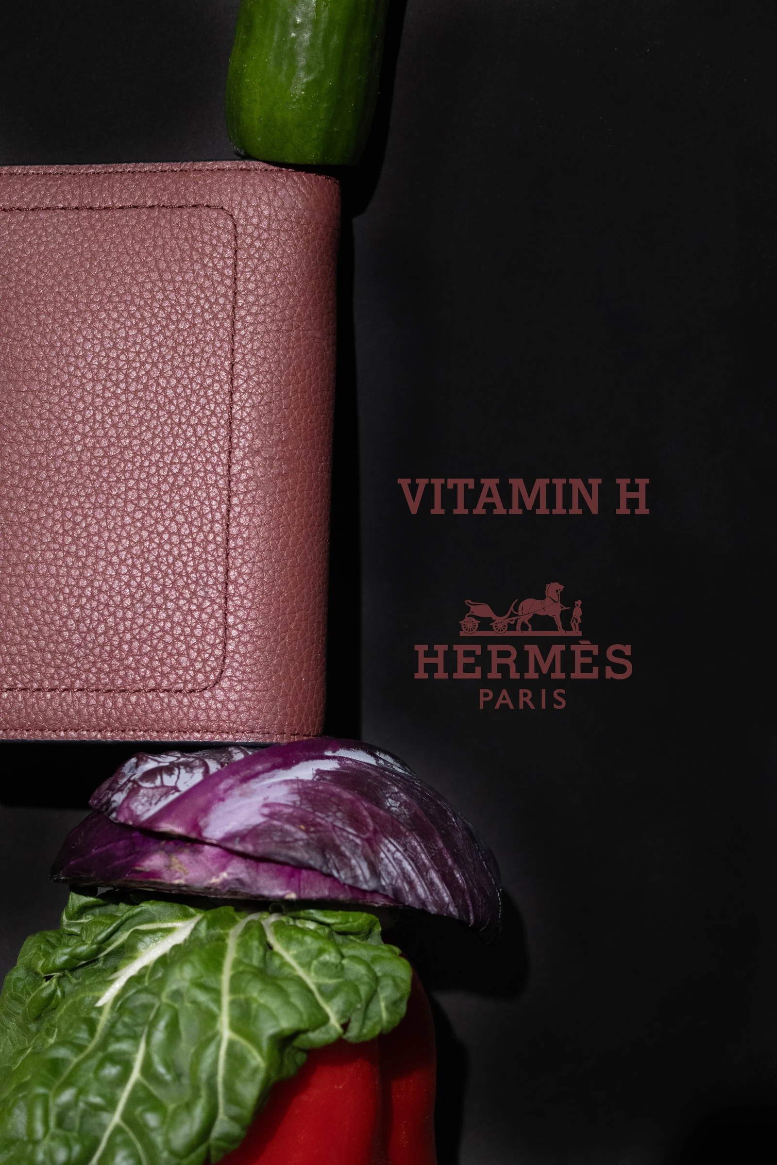 Purple leather accessory balanced among vegetables