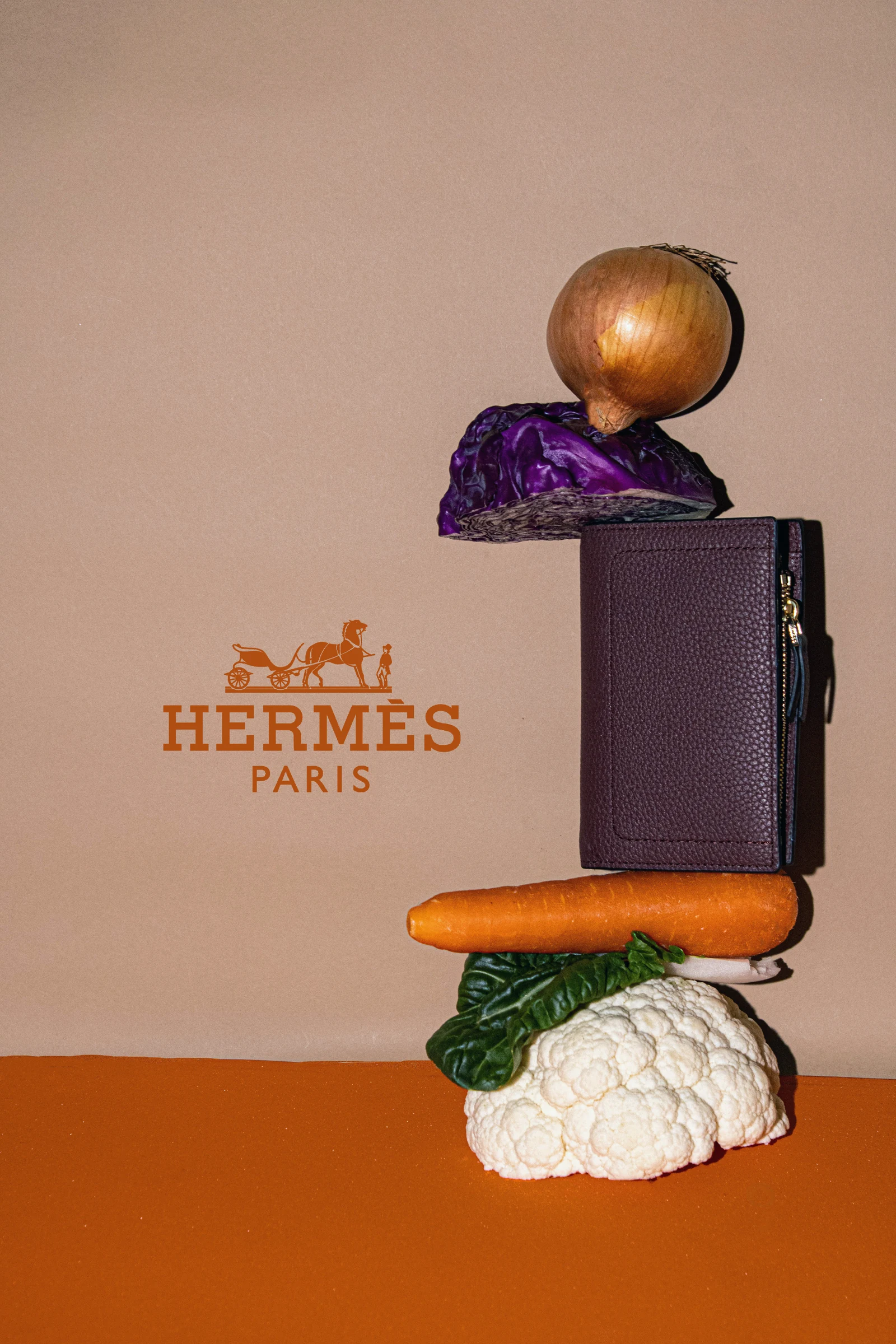 Hermès-inspired still life with stacked vegetables and fruit